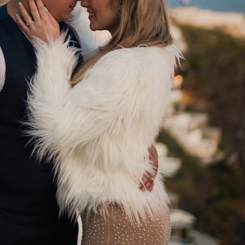 Fluffy white faux fur coat